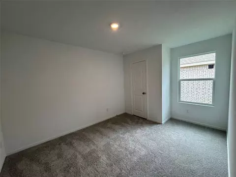Bedroom - 553 Falling Cave Dr, Willis, TX 77378 photo 7 of 8