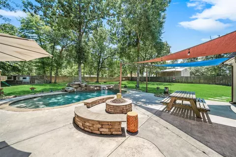 Exterior - 12300 Cedar Ln, Willis, TX 77378 photo 6 of 11