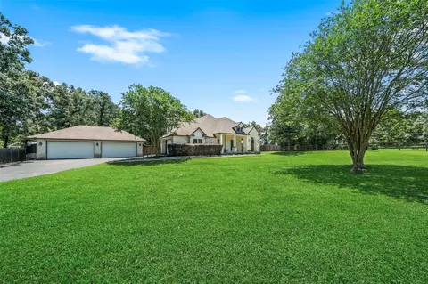 Exterior - 12300 Cedar Ln, Willis, TX 77378 photo 3 of 11
