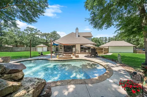 Exterior - 12300 Cedar Ln, Willis, TX 77378 photo 5 of 11