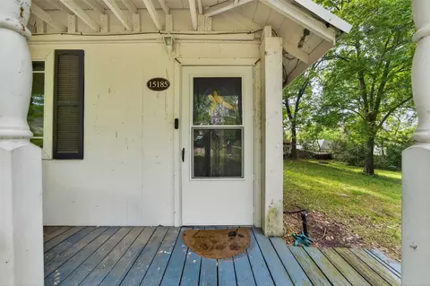 Exterior - 15185 Travis Ln, Willis, TX 77378 photo 1 of 12