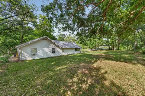 Exterior - 15185 Travis Ln, Willis, TX 77378 photo 6 of 12