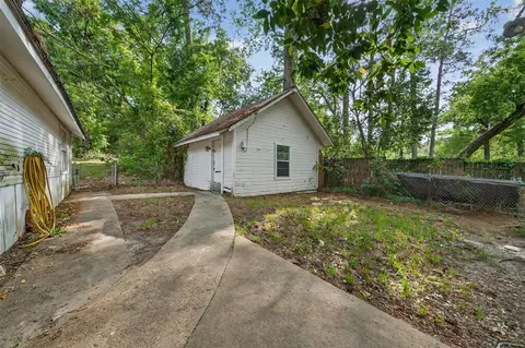 Exterior - 15185 Travis Ln, Willis, TX 77378 photo 9 of 12