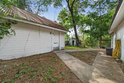 Exterior - 15185 Travis Ln, Willis, TX 77378 photo 10 of 12