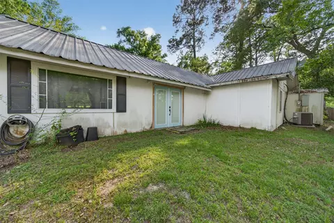 Exterior - 15185 Travis Ln, Willis, TX 77378 photo 11 of 12
