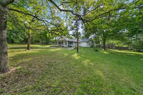 Exterior - 15185 Travis Ln, Willis, TX 77378 photo 3 of 12