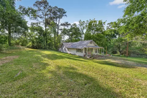 Exterior - 15185 Travis Ln, Willis, TX 77378 photo 5 of 12