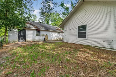 Exterior - 15185 Travis Ln, Willis, TX 77378 photo 8 of 12