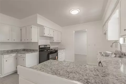 Kitchen - 169 W Sunset Dr, Trinity, TX 75862 photo 2 of 4