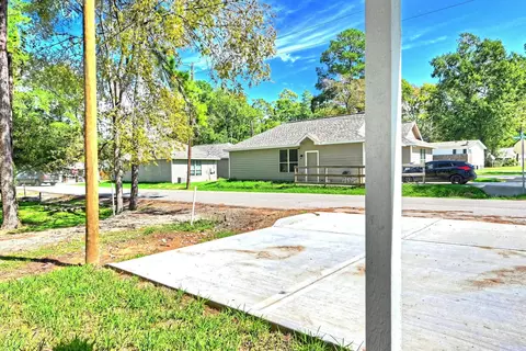 Exterior - 11789 White Cedar, Willis, TX 77318 photo 2 of 9