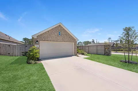 Exterior - 721 Roaring Falls Dr, Willis, TX 77378 photo 3 of 4