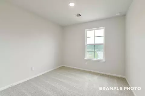 Bedroom - 229 E Canopy Crossing Cir, Conroe, TX 77301 photo 3 of 4