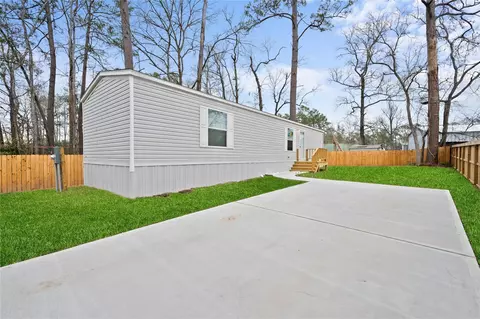 25663 Cheatum Rd, Splendora, TX 77372 photo 1