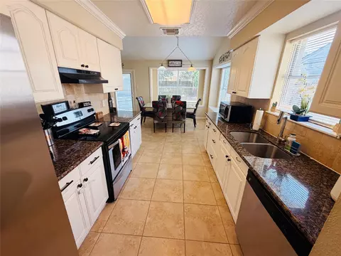 Kitchen - 24115 Spring Gum Dr, Spring, TX 77373 photo 2 of 2