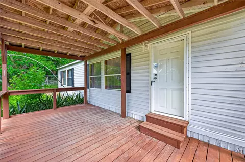 Exterior - 121 E Oak Shadows, Onalaska, TX 77360 photo 7 of 12