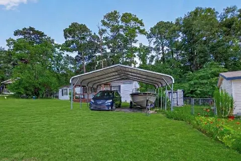 Exterior - 121 E Oak Shadows, Onalaska, TX 77360 photo 4 of 12