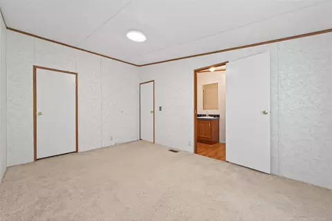 Bedroom - 121 E Oak Shadows, Onalaska, TX 77360 photo 5 of 5