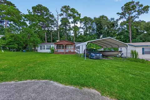 Exterior - 121 E Oak Shadows, Onalaska, TX 77360 photo 3 of 12