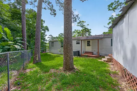 Exterior - 121 E Oak Shadows, Onalaska, TX 77360 photo 9 of 12