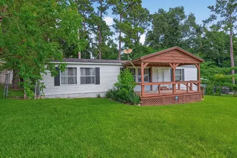 Exterior - 121 E Oak Shadows, Onalaska, TX 77360 photo 2 of 12