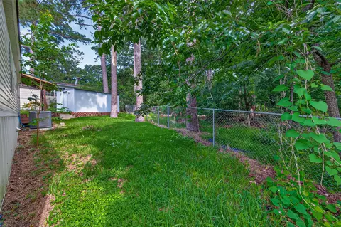 Exterior - 121 E Oak Shadows, Onalaska, TX 77360 photo 8 of 12