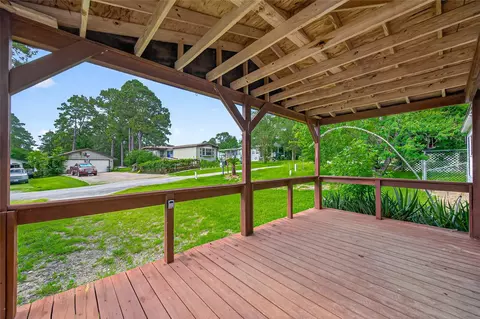 Exterior - 121 E Oak Shadows, Onalaska, TX 77360 photo 6 of 12
