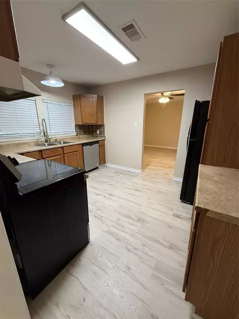 Kitchen - 1102 E 2nd St, Sweeny, TX 77480 photo 2 of 3