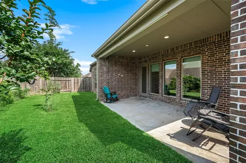 Exterior - 212 Trillium Park Loop, Conroe, TX 77304 photo 5 of 9