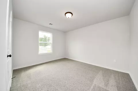 Bedroom - 18745 Loom Dr, Conroe, TX 77306 photo 3 of 10