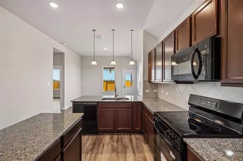 Kitchen - 12239 Danza Dr, Willis, TX 77318 photo 3 of 4