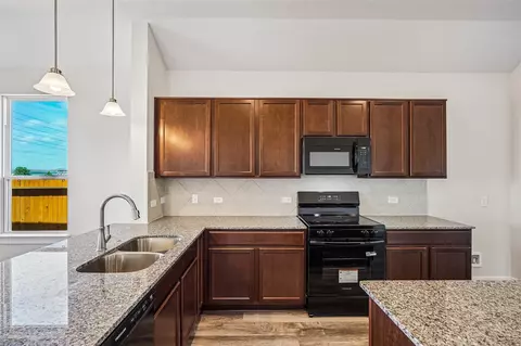 Kitchen - 12239 Danza Dr, Willis, TX 77318 photo 2 of 4