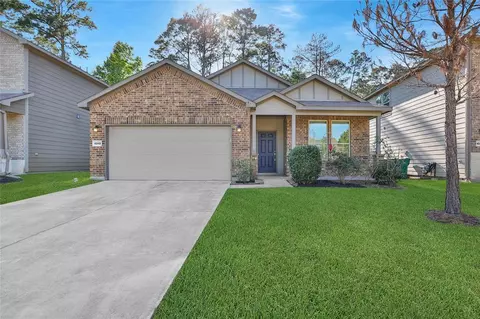 4248 Roaring Timber Dr, Conroe, TX 77304 photo 1