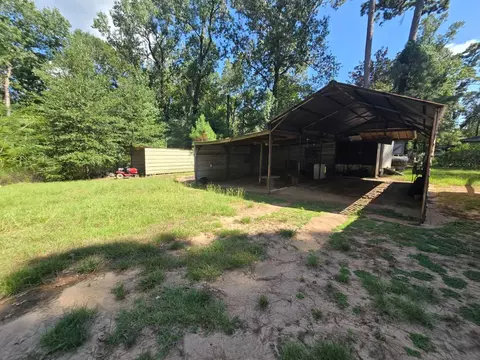 Exterior - 11404 Metts Rd, Conroe, TX 77306 photo 6 of 11
