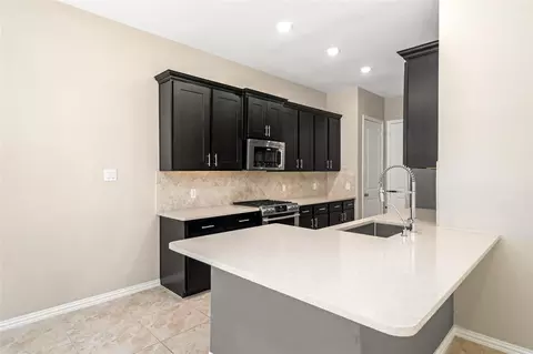 Kitchen - 187 Moon Dance Ct, Conroe, TX 77304 photo 3 of 5