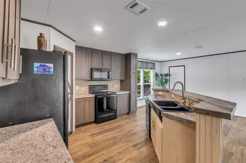 Kitchen - 9529 Cypress Dr, Willis, TX 77318 photo 1 of 5
