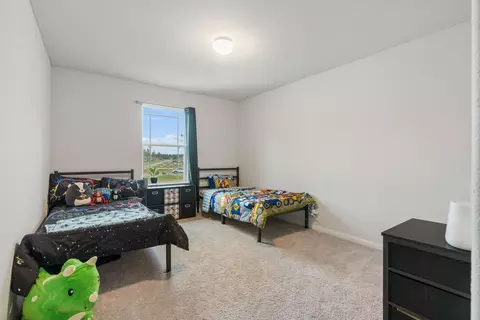 Bedroom - 16680 Rockwall St, Conroe, TX 77303 photo 5 of 6
