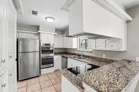 Kitchen - 2 Queens Ct, Conroe, TX 77304 photo 2 of 2