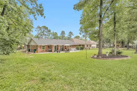55 E Rolling Hills Dr, Conroe, TX 77304 photo 1