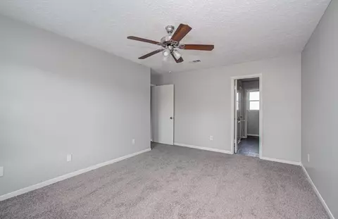 Bedroom - 6935 Falling Waters Dr, Spring, TX 77379 photo 2 of 9