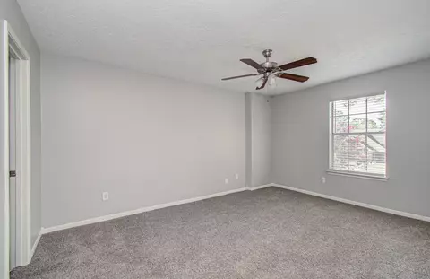 Bedroom - 6935 Falling Waters Dr, Spring, TX 77379 photo 3 of 9