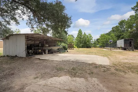 Exterior - 14985 Wiggins Rd, Conroe, TX 77302 photo 11 of 12