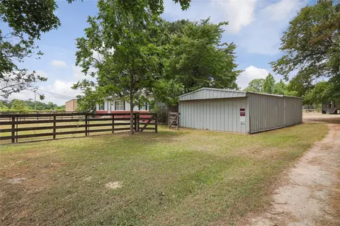 Exterior - 14985 Wiggins Rd, Conroe, TX 77302 photo 1 of 12