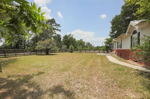 Exterior - 14985 Wiggins Rd, Conroe, TX 77302 photo 2 of 12