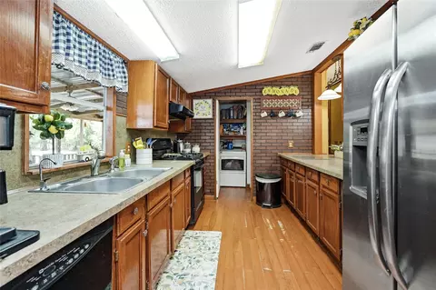 Kitchen - 14985 Wiggins Rd, Conroe, TX 77302 photo 2 of 5