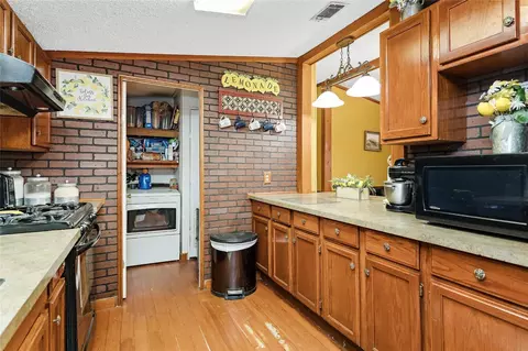 Kitchen - 14985 Wiggins Rd, Conroe, TX 77302 photo 4 of 5