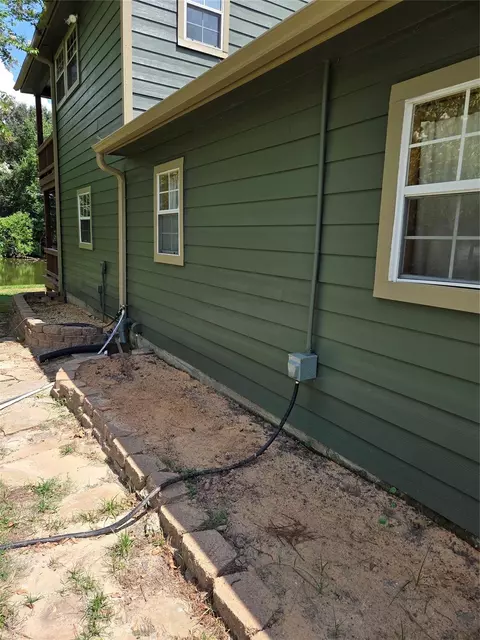 Exterior - 15318 Arrowhead Loop W, Willis, TX 77378 photo 4 of 5