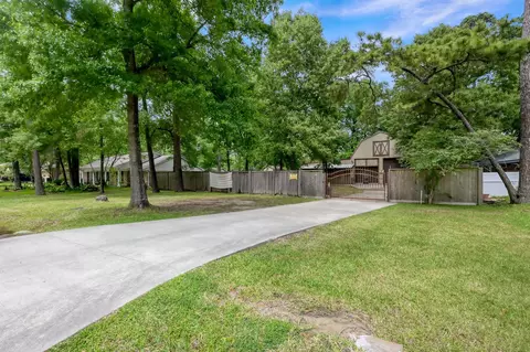 Exterior - 403 Spring Woods Dr, Spring, TX 77386 photo 2 of 9