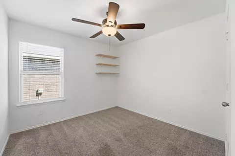 Bedroom - 2419 Roaming Elk Ct, Spring, TX 77373 photo 2 of 3