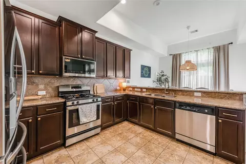 Kitchen - 702 Aulia Ln, Spring, TX 77386 photo 2 of 2