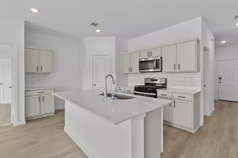 Kitchen - 14306 Moonflower Dr, Splendora, TX 77372 photo 2 of 3